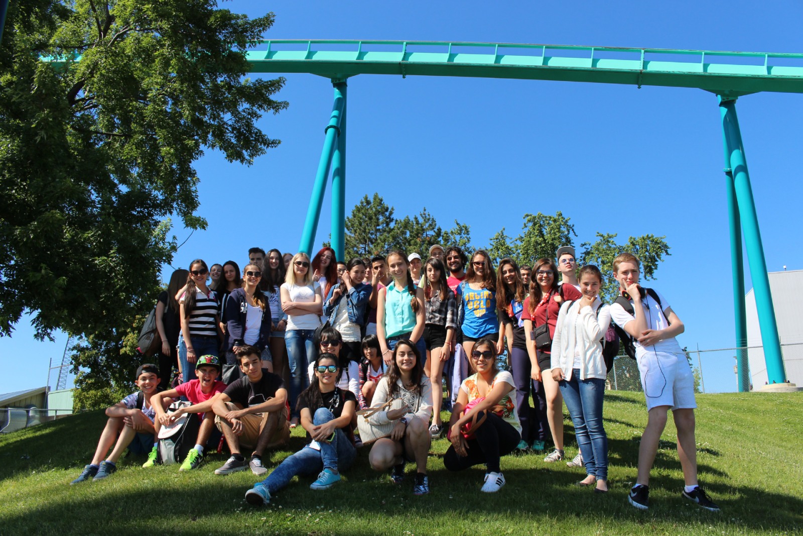 A group of teenage students posing together at Canada’s Wonderland